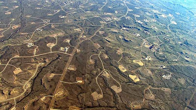 An aerial perspective of the fractured landscape in Wyoming, where more than 1,000 wells have been abandoned