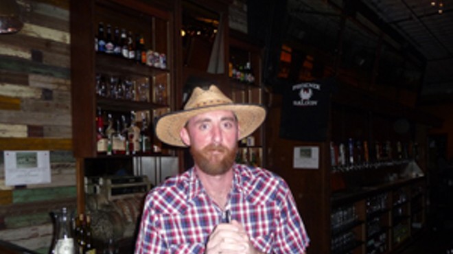 Bartender Chris Hooker at the Phoenix Saloon