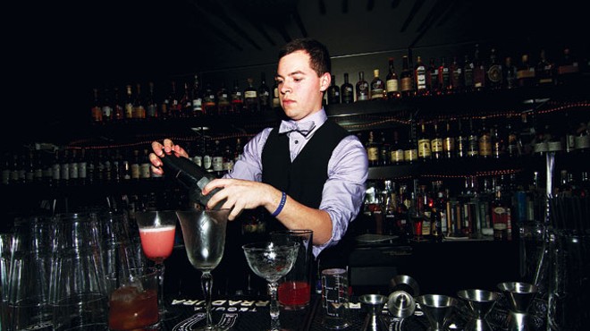 Bartender Stephan Mendez shakes and stirs at 1919.