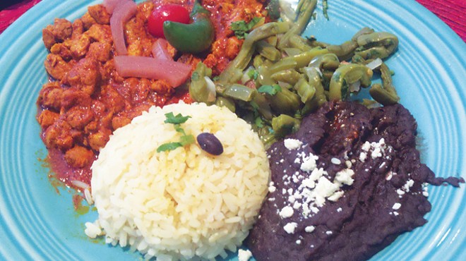 Cascabel's Cochinita pibil, served with white rice and black beans