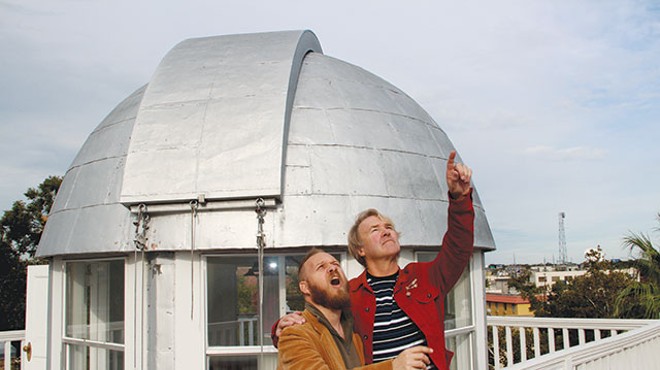 Gary Sweeney teaches Chris Sauter a thing or two at the Maverick-Carter House observatory
