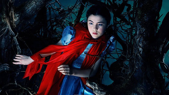 Little Red Riding Hood (Lilla Crawford) takes an eerie route to grandma's house in Into the Woods
