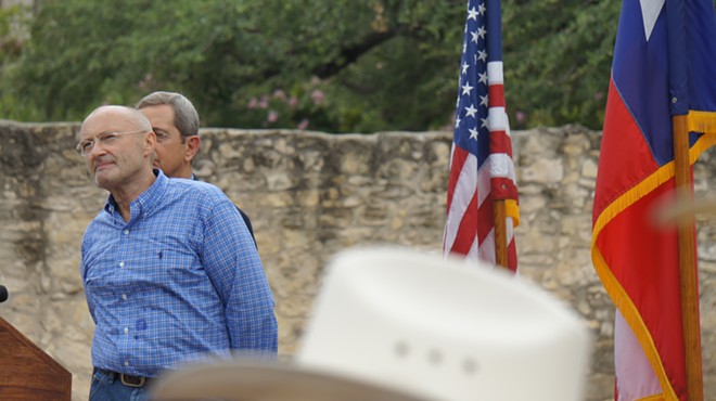 Former Genesis member and Alamo enthusiast Phil Collins is joined onstage by Texas Land Commissioner Jerry Patterson in front of the Alamo on June 26, 2014. Collins formally announced his intention to donate his entire private collection of Texas Revolution memorabilia to the state of Texas.
