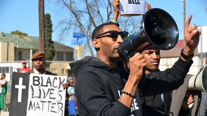 Mike Lowe of SATX4 leads the die-in at the Martin Luther King, Jr. Day March in San Antonio on January 19, 2015.