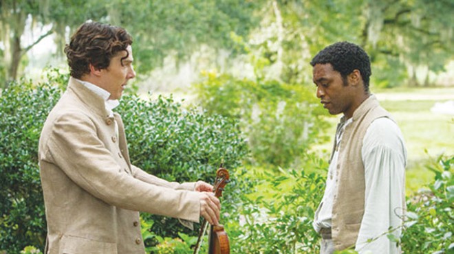 Shut up and play your violin—Plantation owner William Ford (Benedict Cumberbatch) and slave Solomon Northup (Chiwetel Ejiofor)