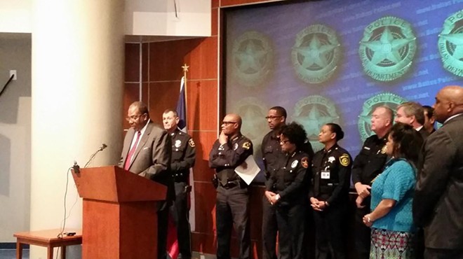 Texas Senator Royce West (D-Dallas) announces details behind a police body-camera bill while flanked by law enforcement officials at Dallas Police Headquarters.
