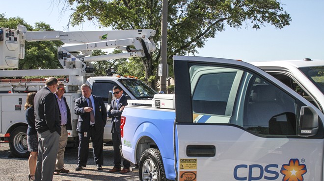 City and CPS officials get a look at one of the utility's new Plug-In F-150s.
