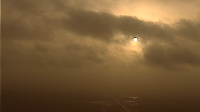The sun over San Antonio tries to break through the Saharan dust.