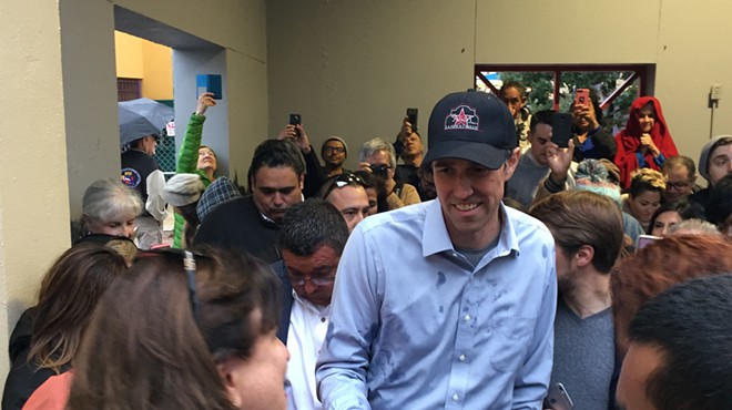 Beto O'Rourke presses the flesh during a 2018 campaign stop in San Antonio.