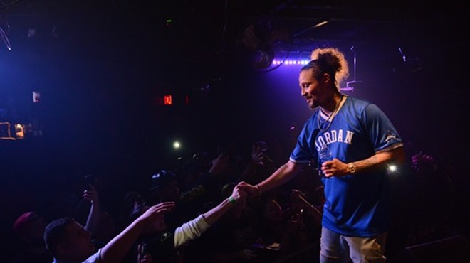 Bizzy Bone greeting fans at Fitzgerald's in 2018
