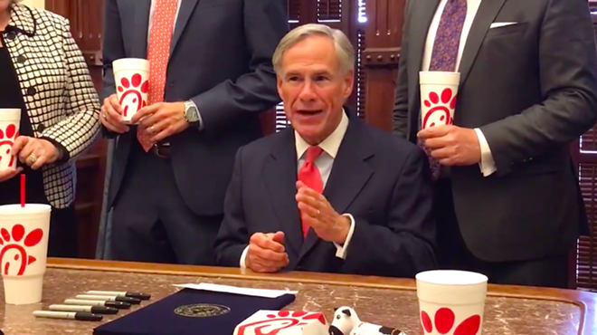 Gov. Greg Abbott makes a point about religious freedom with Chick-fil-A cups carefully arranged in the shot.