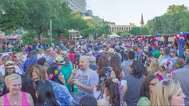 Revelers flood the popular Night in Old San Antonio Event during a past Fiesta.