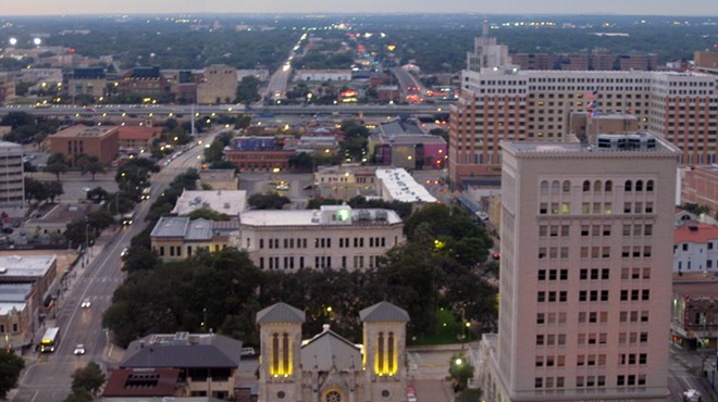 As part of a deal to bring a new skyscraper to downtown San Antonio, the Municipal Plaza Building to the right of the San Fernando Cathedral in this photo will be sold to a developer for residential and retail space.