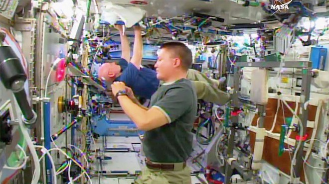 NASA Astronauts Scott Kelly and Kjell Lindgren doing space stuff, no big deal.
