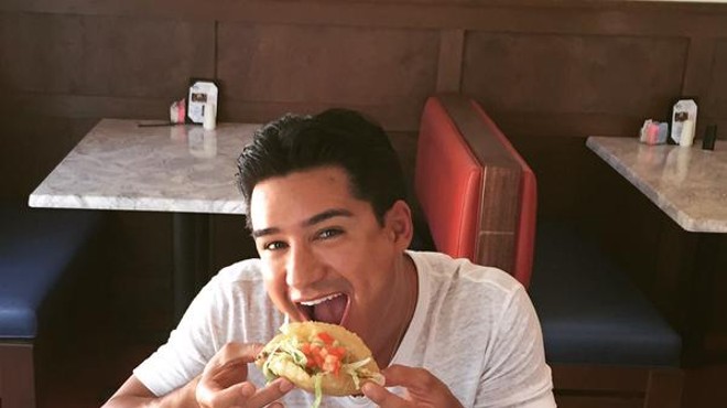 "Crushin the world famous 'puffy tacos' at Violas Ventanas in San Antonio, Tx!" And our hearts.