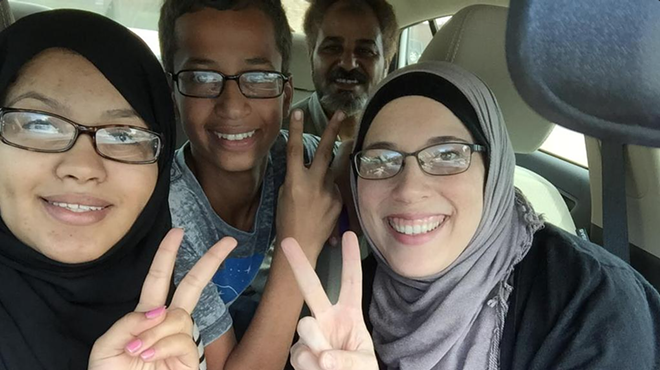14-year-old Ahmed Mohamed (second from left) was arrested Monday after officials mistook his homemade clock for a bomb.