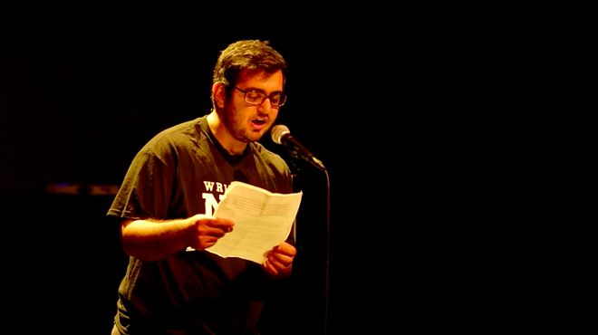 Amir Safi performing 'An Ode to Whataburger.'