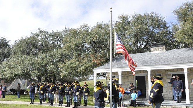 106 Buffalo Soldiers living historians raise the flag at the Institute of Texan Cultures Back 40