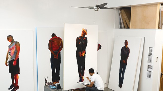 Vincent Valdez in the studio, working on 'The Strangest Fruit', 2013, which explores the history of lynchings of Mexicans in the Southwest.