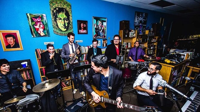 Volcán performing at Imagine Books and Records.