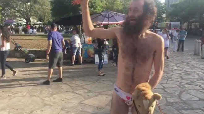 Man Rides Stick Pony, Swings Rubber Chicken in His Underwear at the Alamo