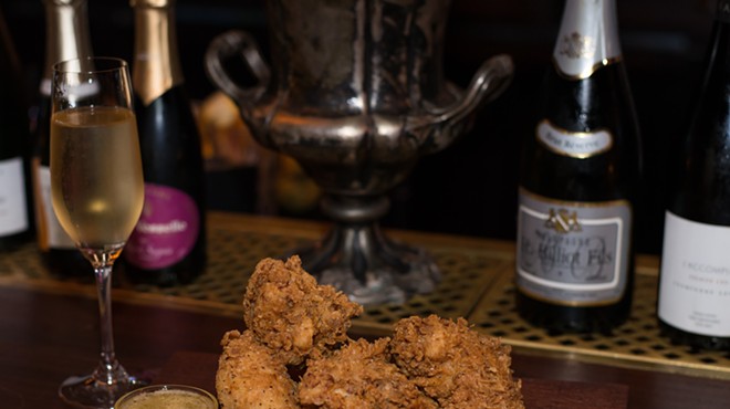 Downstairs at Esquire Is Classing Up Tuesdays with Champagne and Chicken
