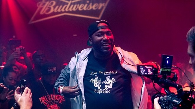 Bun B's all smiles, wearing the shirt with the most truth.
