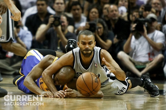 San Antonio's Tony Parker and Golden State's Jarret Jack get tangled up on the ground fighting for the ball during the 2nd half of Game 5 of the Western Conference Semi-Final Playoff series on Tuesday May 14th, 2013 in San Antonio, Texas (Josh Huskin / www.joshhuskin.com)