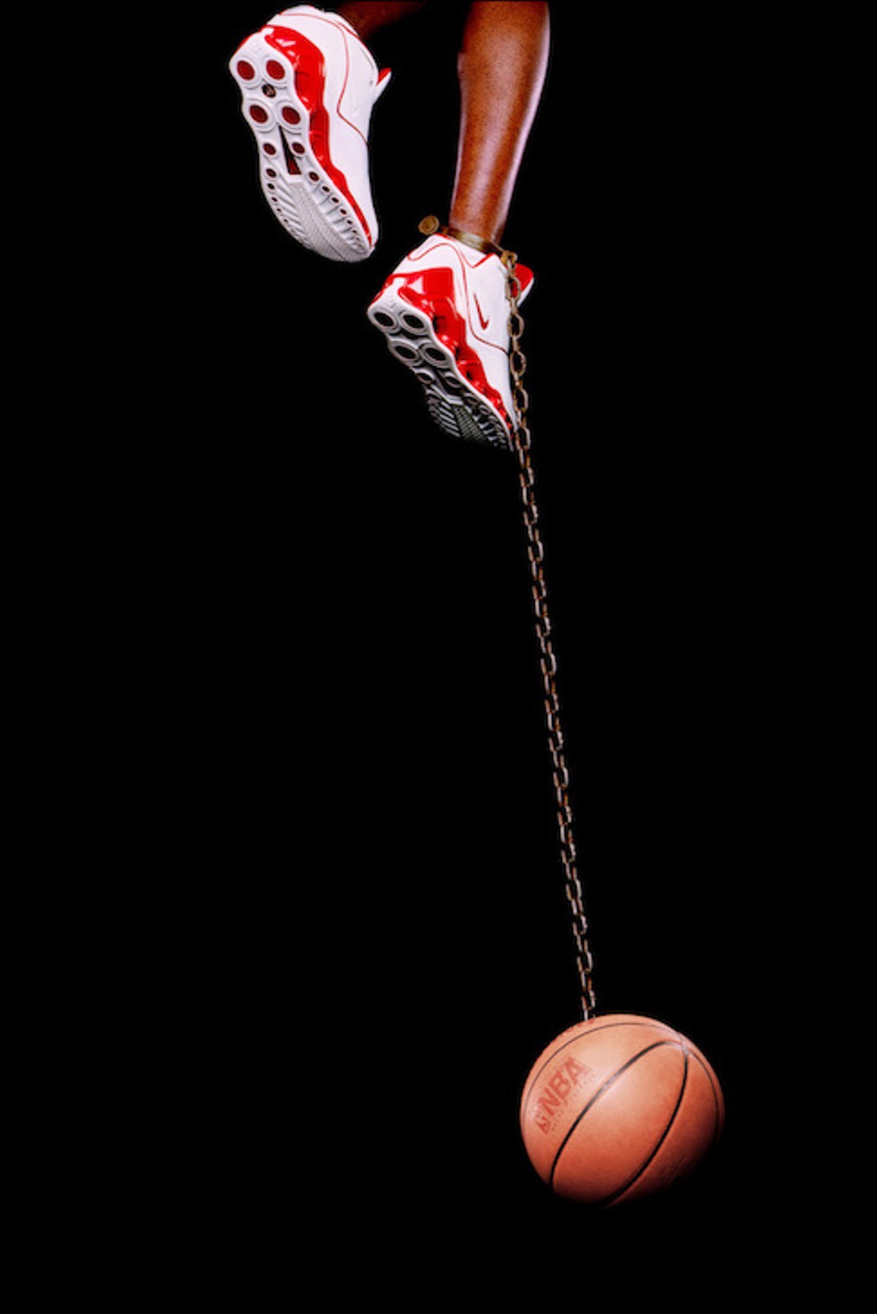 Hank Willis Thomas, Basketball and Chain, 2003. Digital C-print.