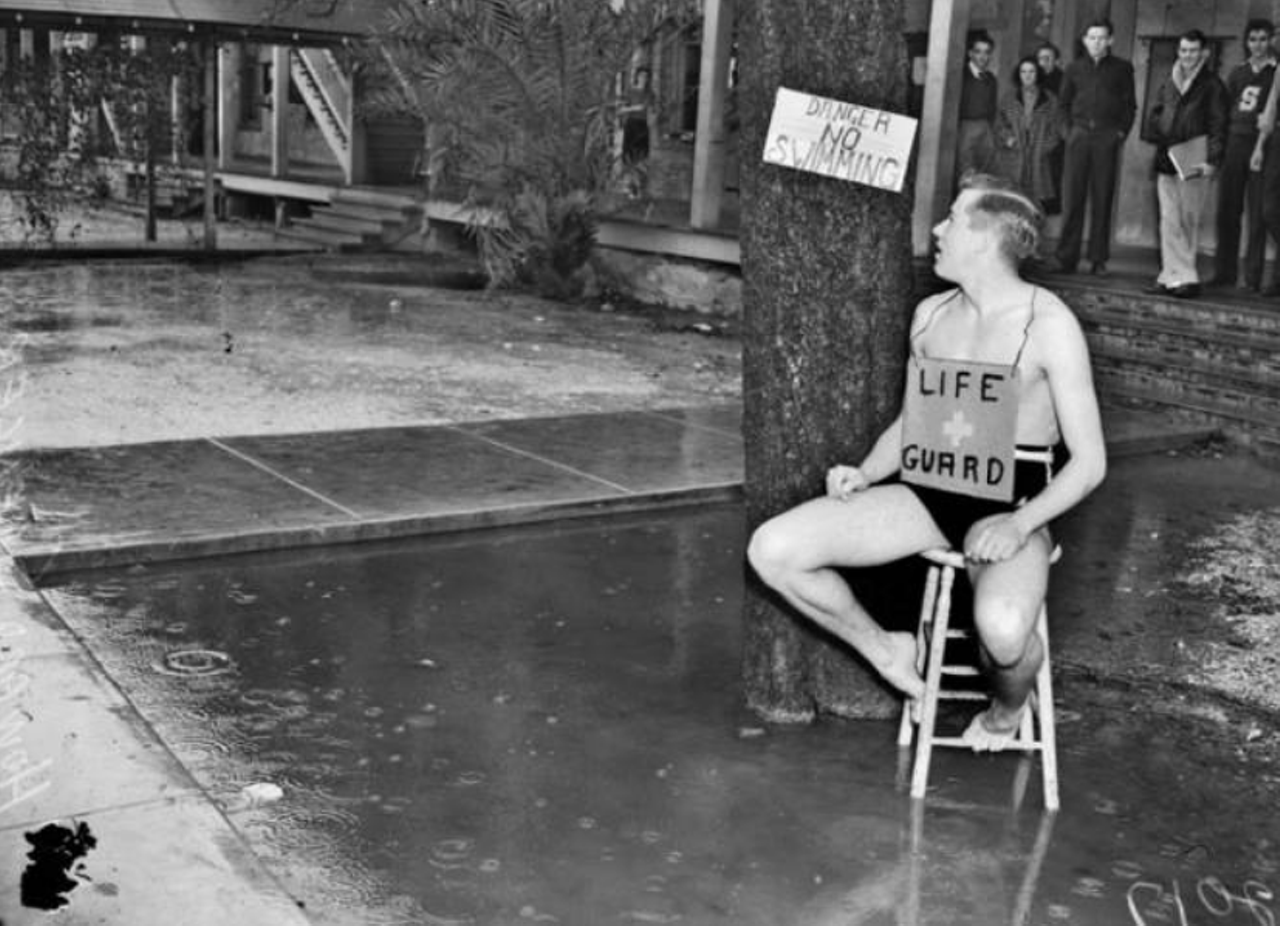 Howard Spencer served on the executive council of San Antonio Junior College when he decided enough was enough. He grabbed a stool and played lifeguard to protest deterioration of the campus in this monumental 1939 photo.