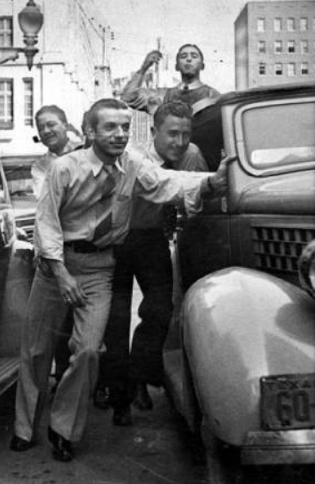 After finishing class at Draughn's Business College, Oscar A. Elizondo (front) and friends pretended to push a car.