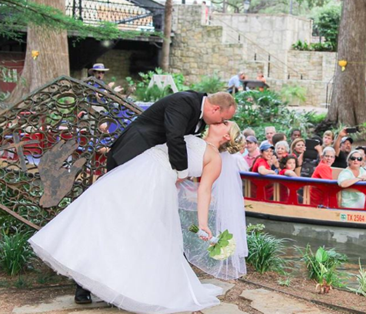 Be a wedding crasher at Marriage Island
San Antonio River Walk in front of the Hotel Contessa, 
Ok so this isn’t something you can really plan, but if you happen to be in the area and see some peeps in wedding attire, take advantage of the situation. There’s an islet in the middle of the River that is supposedly heart-shaped and considered good luck to new marriages. Now, more than 200 couples get married here annually.
Photo via Instagram / karina_franco_photography