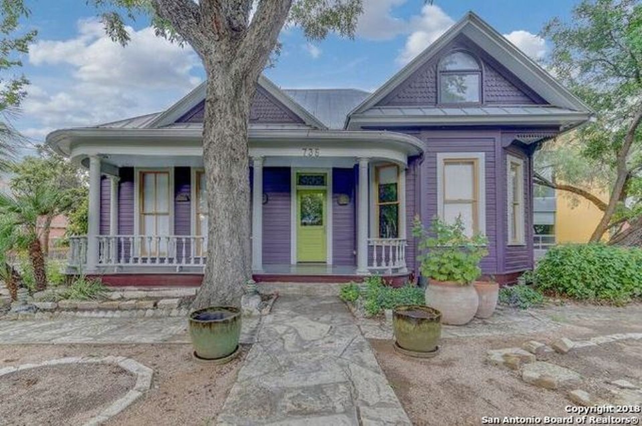 The home is back to a purplish hue, complete with a bright light green door.