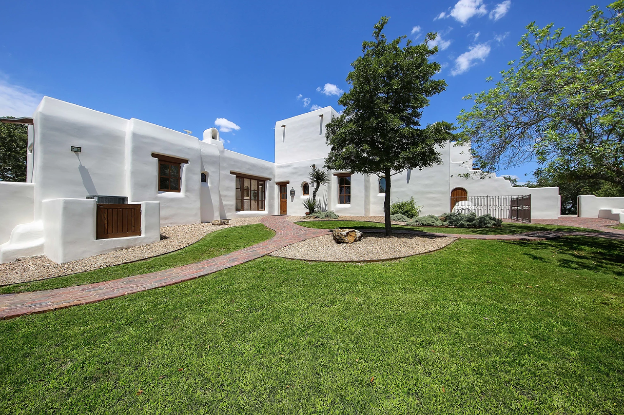 The Santa Fe-style home was designed by acclaimed architect Bill Tull.