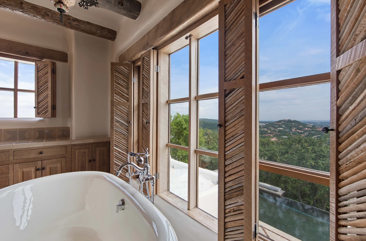 The master bathroom includes this amazing bathtub – with an even more amazing view.