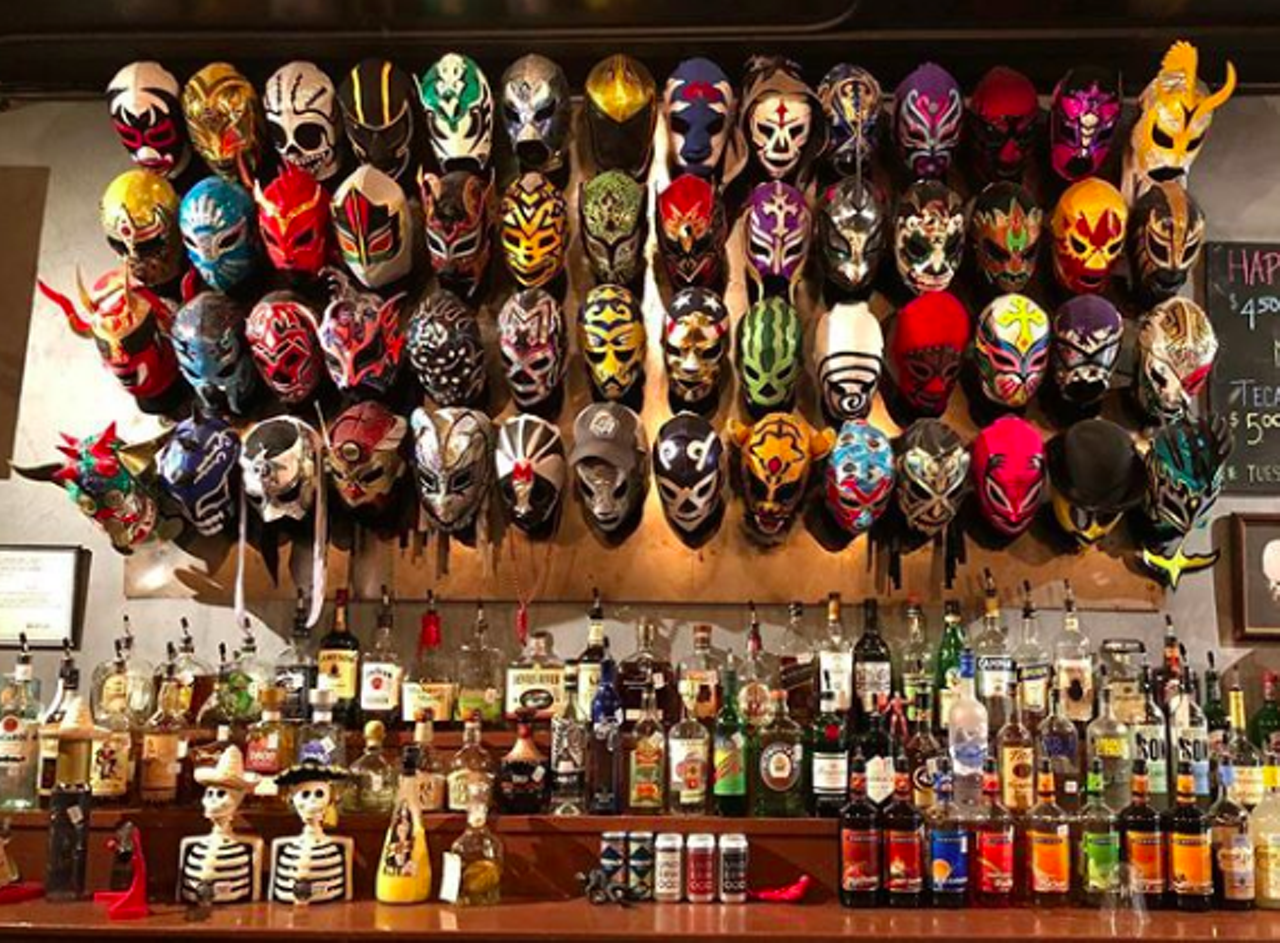 El Luchador Bar
622 Roosevelt Ave, (210) 272-0016, facebook.com/luchadorbarsa
Puro San Antonians love lucha libre, so much that this themed bar is always poppin’ Complete with a wall of lucha libre masks behind the bar and various decorations throughout the space, this Lone Star neighborhood bar keeps it going with playful cocktails too. And you’ll have plenty to do here too, as the bar offers lots of cool events, from trivia nights and live DJs to loteria and even live lucha libre matches on special occasions.
Photo via Instagram / luchadorbarsa