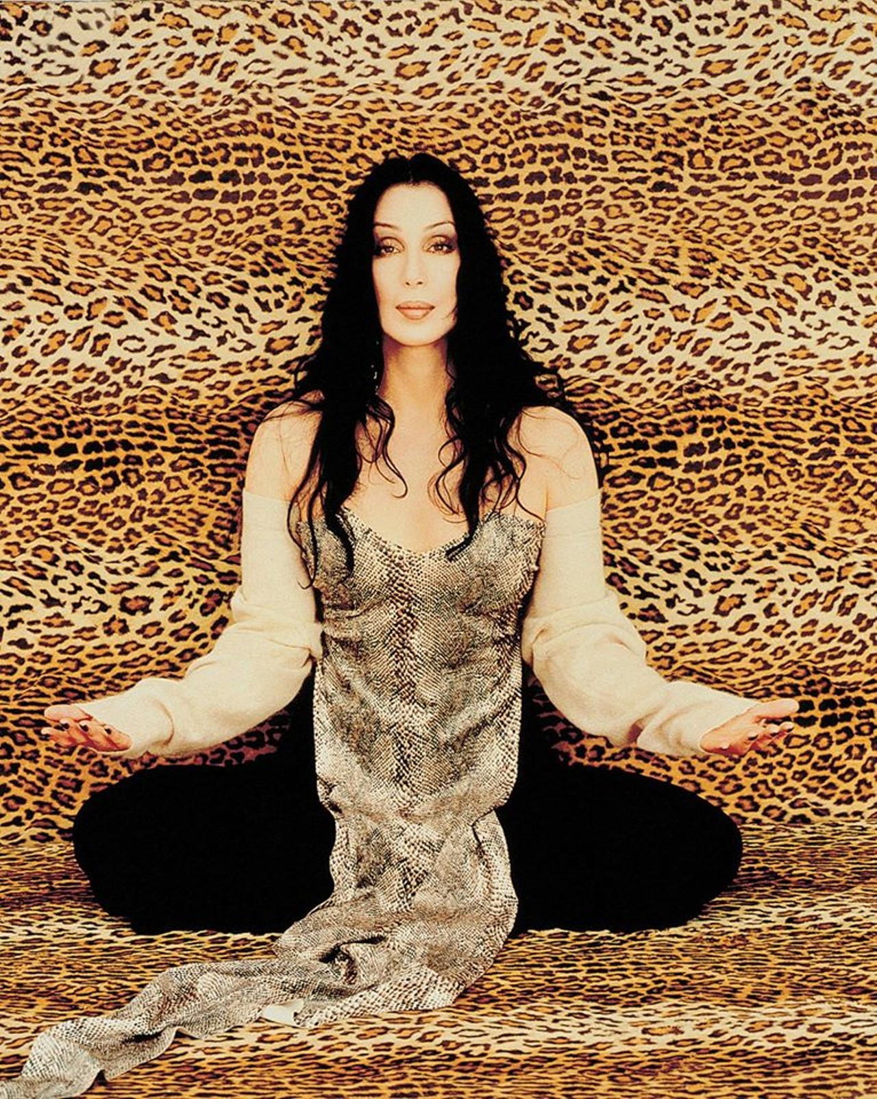 '90s leapord namaste Cher. Do you believe in enlightenment?
Photo via Facebook / Cher