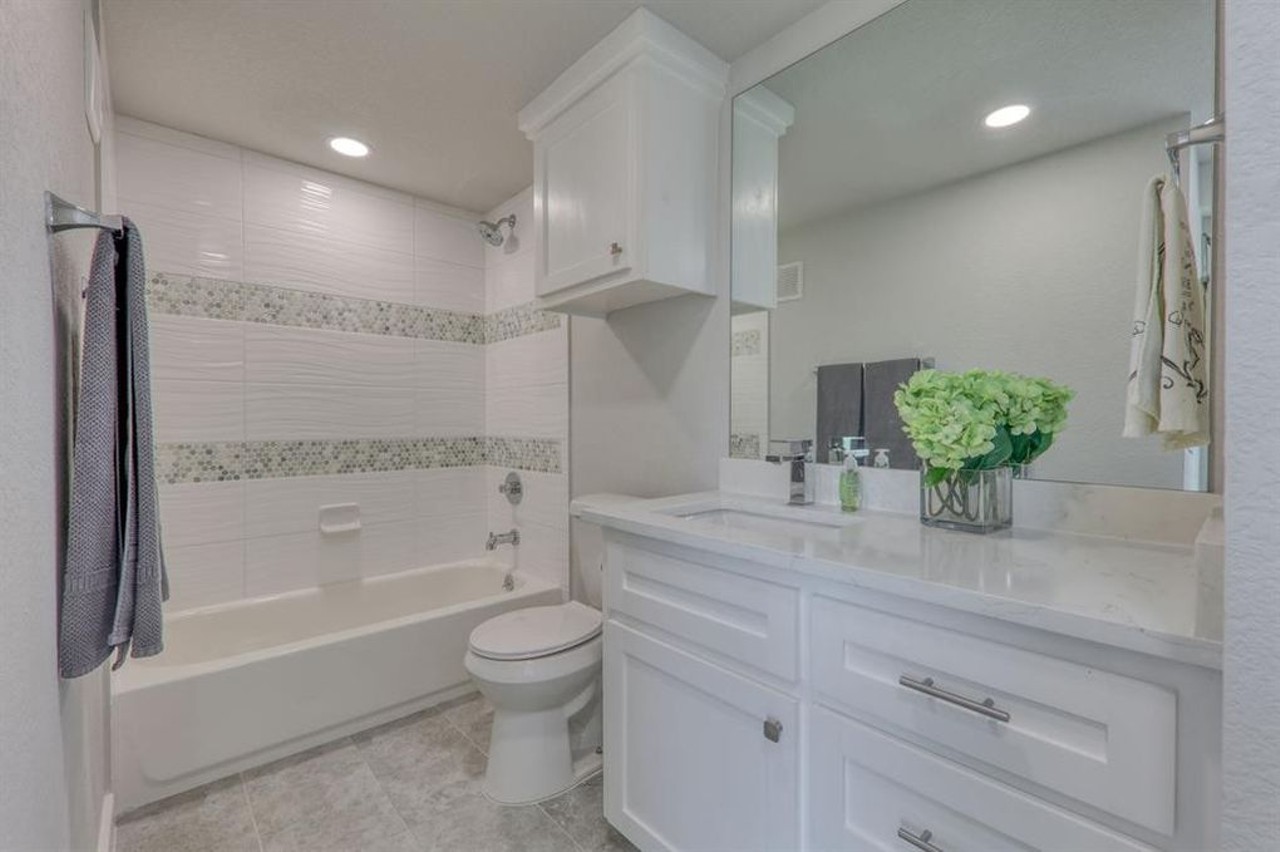 The monochromatic look in the bathrooms give a clean look.