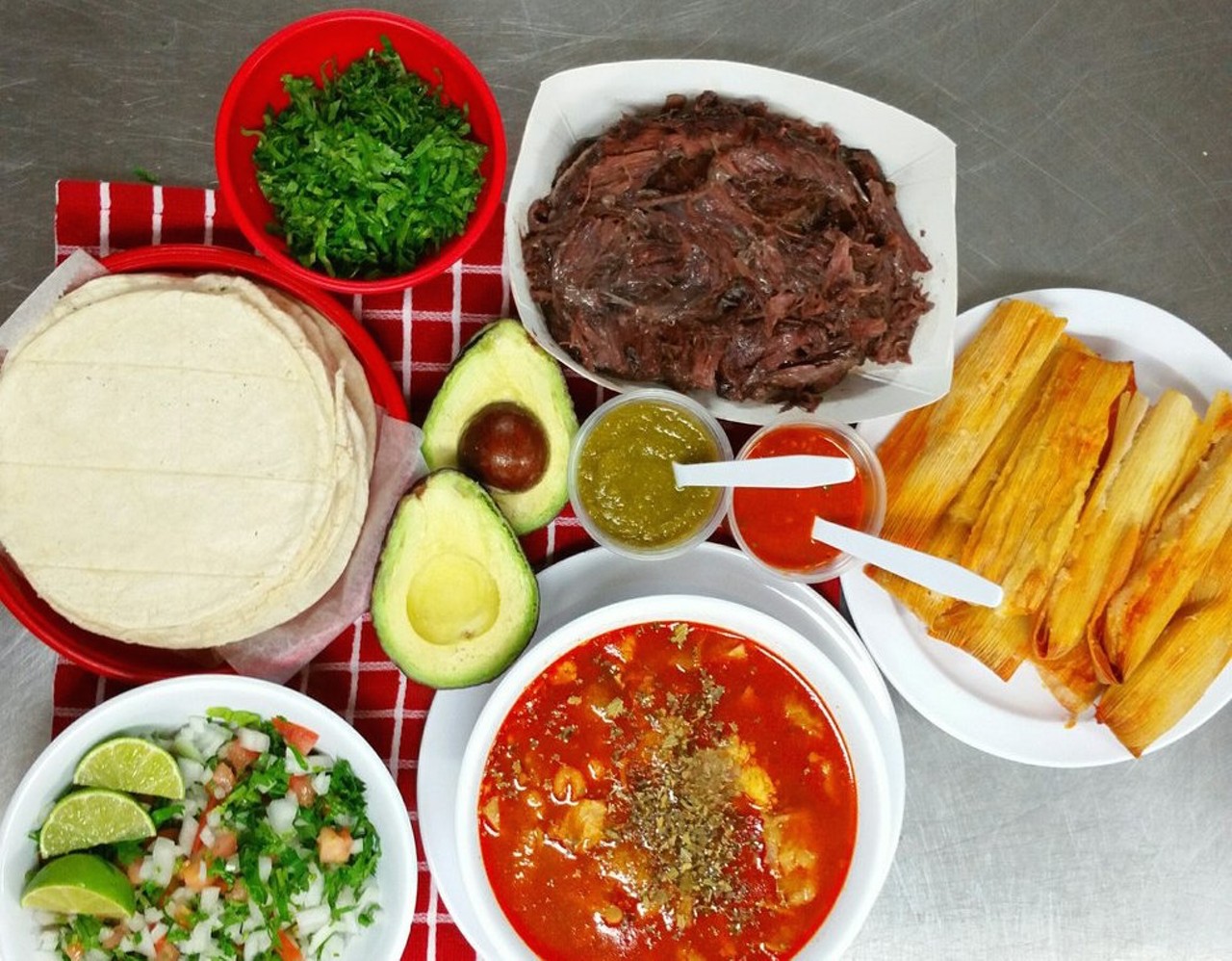 Morenita Barbacoa
4302 S Flores St, (210) 409-2783, facebook.com/MORENITABARBACOA
Not far from Rudy’s Seafood you’ll find Morenita Barbacoa, not to be confused with La Morenita Tortilleria. This South Side outpost not only dishes out flavorful barbacoa, but also stuffed tamales. Make plans to come when MB is open on the weekends and trust us, you’ll be eating good here.
Photo via Yelp / Morenita Barbacoa