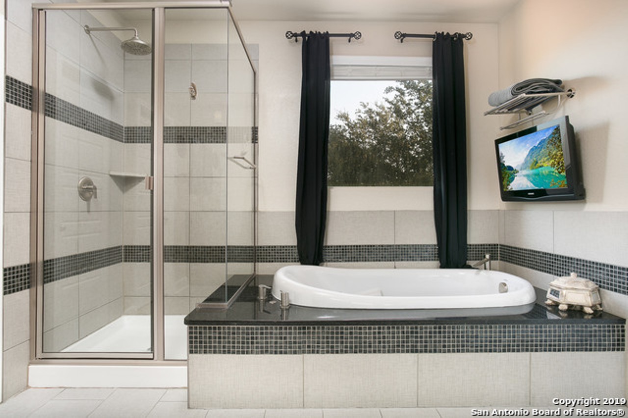 Obviously, Danny decked out the master bathroom with a mounted TV to enjoy from the tub.
