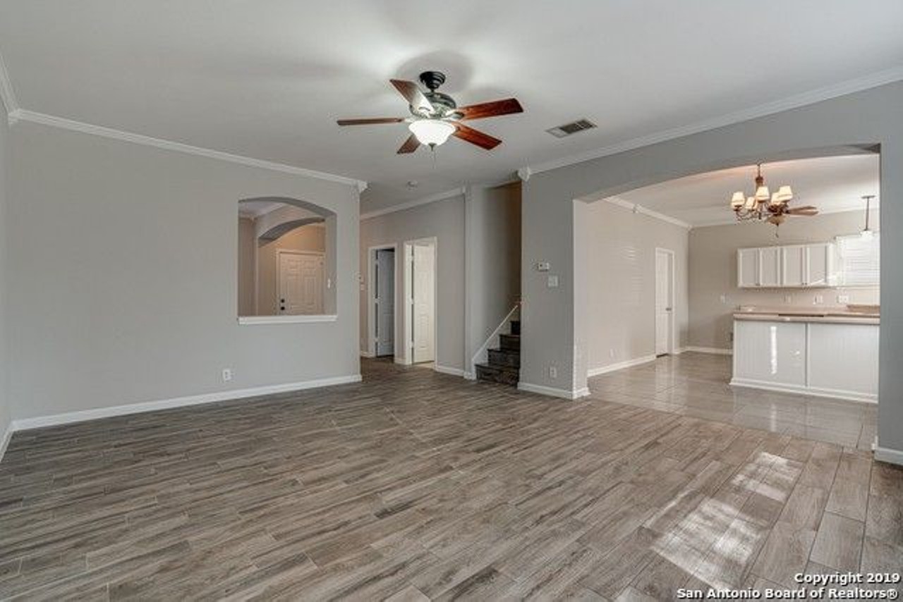 In addition to a spacious living area seen here, there's also an upstairs loft/gaming room for you to utilize.