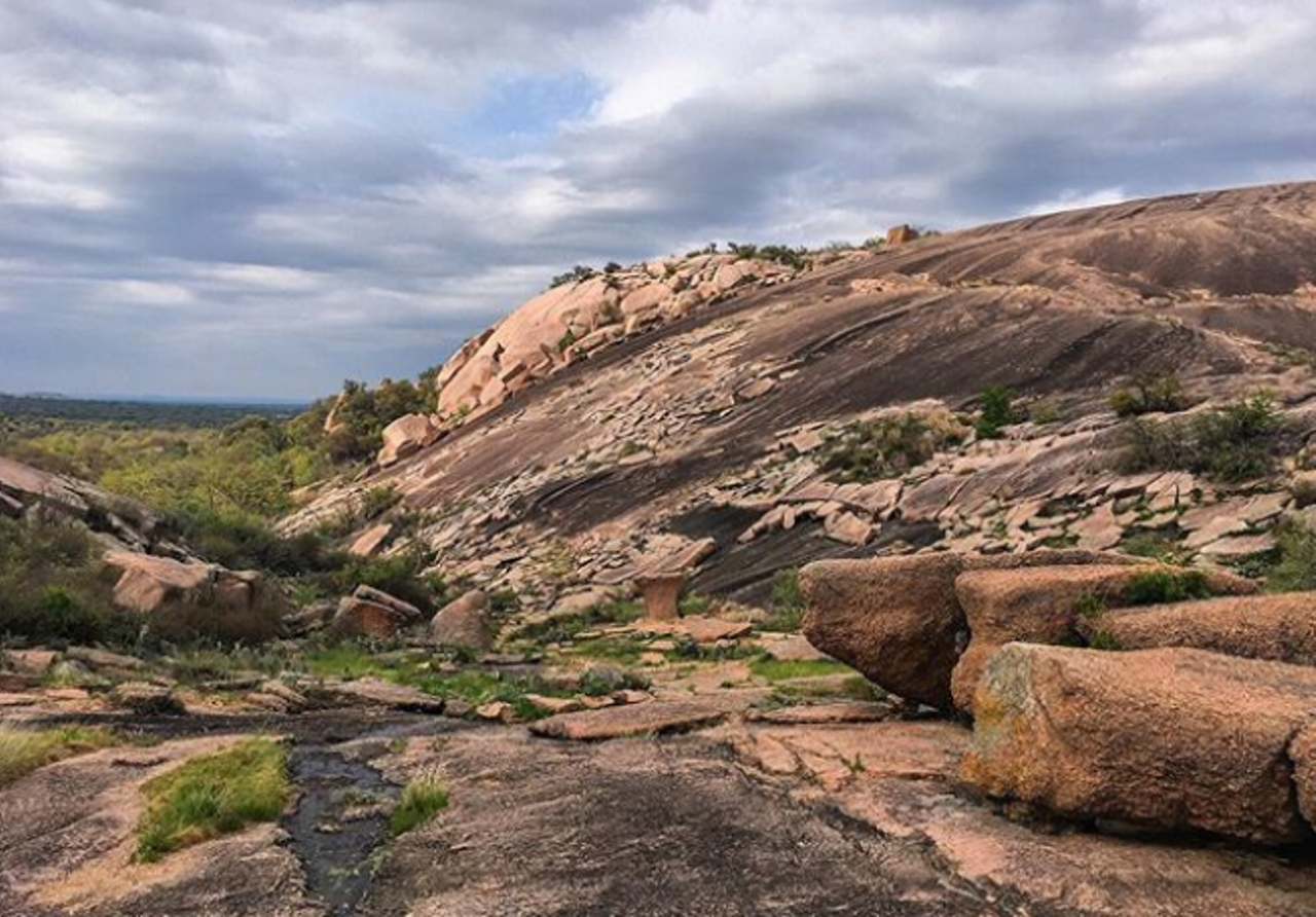 Reach new heights at Enchanted Rock State Natural Area
16710 Ranch Road 965, Fredericksburg, (830) 685-3636, tpwd.texas.gov
You’ll have to register early, but going to Enchanted Rock is absolutely worth the pain of having to plan ahead. C’mon — “enchanted” is literally in the name. It’ll take a little bit of work to get to the top and some good shoes, but once there, you get to look out on the beautiful Texas Hill Country and steal a kiss from your climbing partner. After you’ve climbed to the top, you can get away from the big city for a while longer and wander around this gorgeous oasis.
Photo via Instagram / intents_life