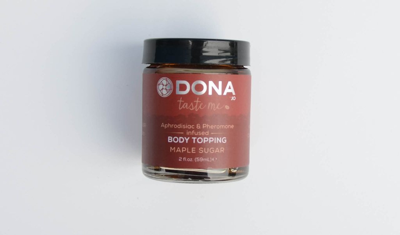 6. Dona Taste Me Body Topping in Maple Sugar
Cost: $12.99
Aroma: Had us Jonesin&#146; for some hot cakes
Taste: There&#146;s a hint of vanilla in this too-sweet syrup, but there&#146;s a slightly synthetic aftertaste we can do without.
Functionality: You&#146;d have to be really coordinated to not spill this 2-ounce jar all over your partner who can don the cheap complimentary blindfold that comes with the syrup. We briefly considered combining it with the Boink N&#146; Oink, but thought better of it. Includes pheromones if you&#146;re into that sort of thing. 
Love Score: 3 hearts