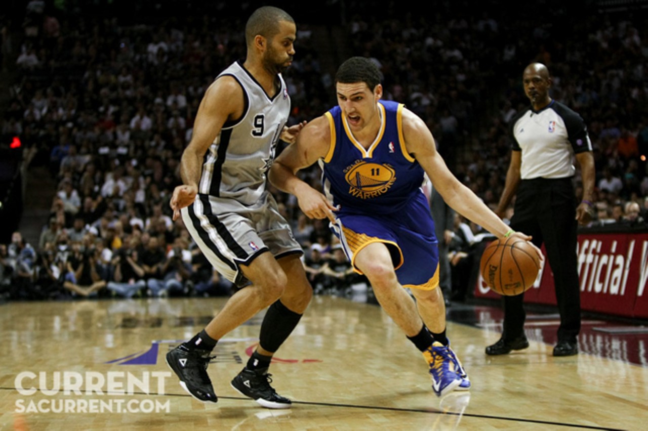 Golden State's Klay Thompson drives on San Antonio's Tony Parker during the 1st half of Game 5 of the Western Conference Semi-Final Playoff series on Tuesday May 14th, 2013 in San Antonio, Texas (Josh Huskin / www.joshhuskin.com)