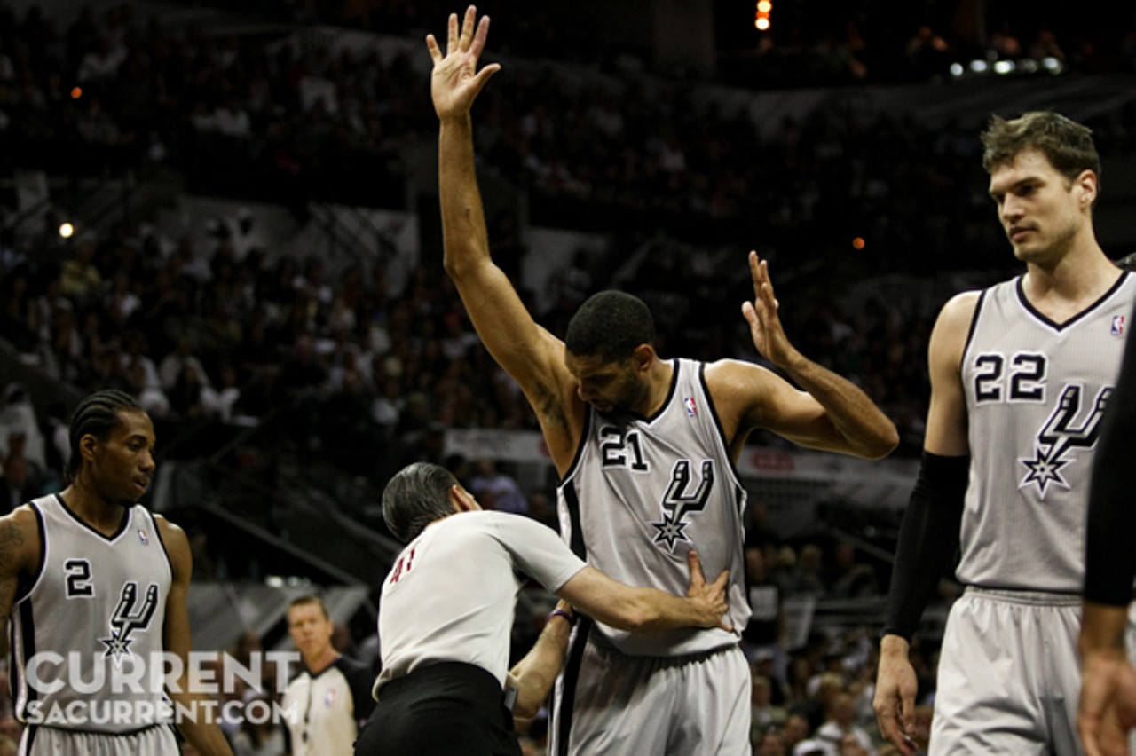 San Antonio's Tim Duncan responds to getting called for a foul while the official, Ken Mauer, looks for his number on the back of the jersey during the 1st half of Game 5 of the Western Conference Semi-Final Playoff series on Tuesday May 14th, 2013 in San Antonio, Texas (Josh Huskin / www.joshhuskin.com)