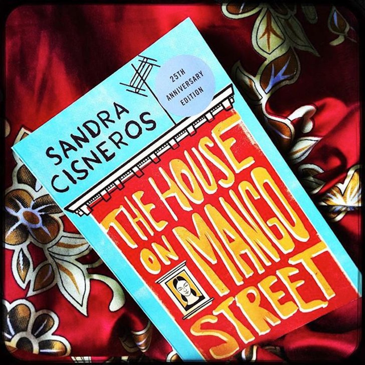 Go to a library, and silently sob into the pages of local author, Sandra Cisneros. 
Photo via Instagram (theminitaco)