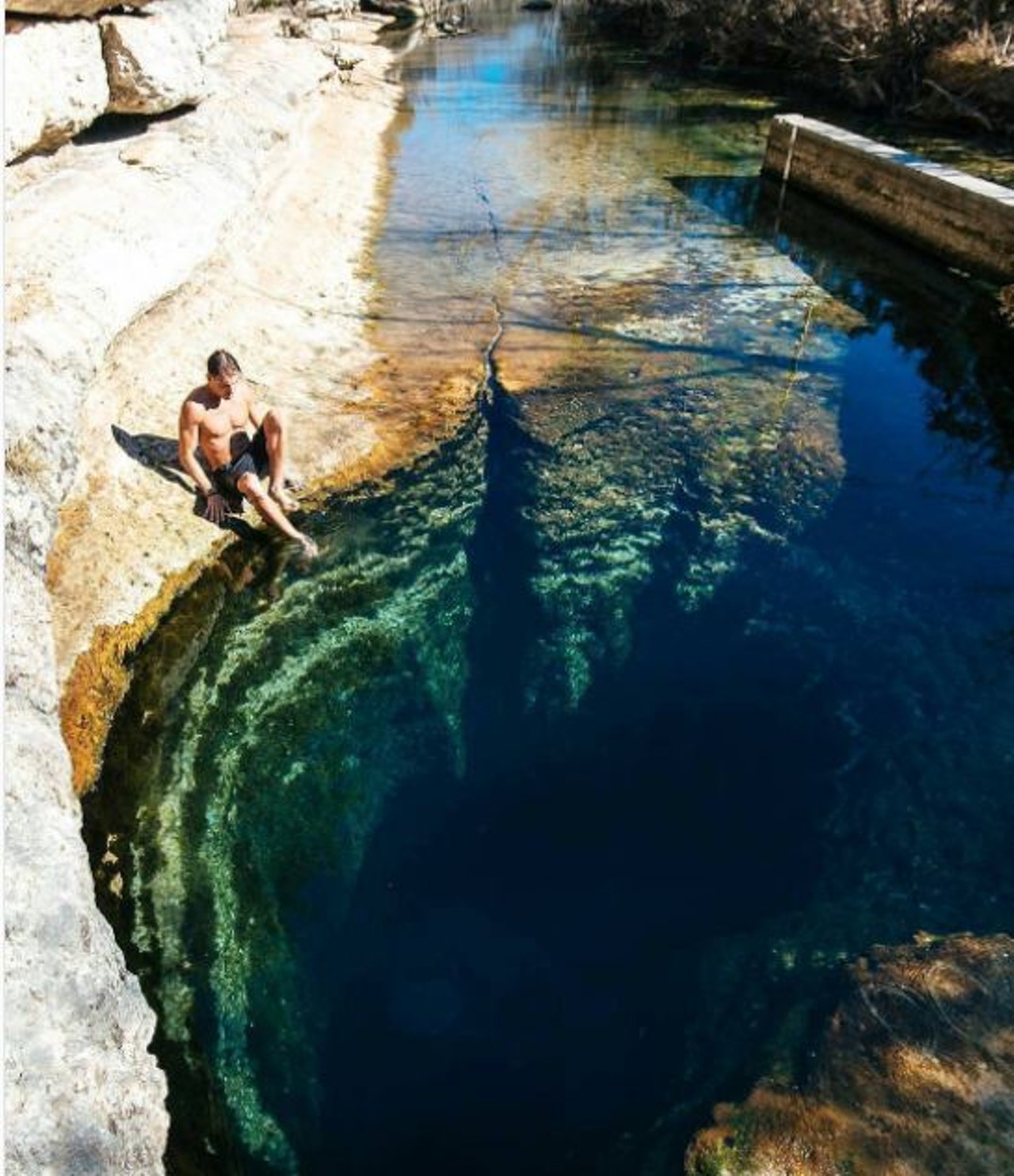 Jacob&#146;s Well 
Jacob&#146;s Well is a largely vertical, very deep swimming hole fed by an underwater spring, keeping the water 68 degrees year-round. The roughly 13-foot wide hole beckons daredevils to flip and leap into the hole from overlooking rocks like Mario into the sewer pipes. It should also be mentioned that it&#146;s been called the most dangerous diving site in the world. The labyrinthine underwater cave systems that branch out underneath the surface have swallowed up so many daredevil scuba divers that eventually a grate was put in around 100 feet down to block the depths. It was quickly removed, a plastic slate left in its place saying: &#147;you can&#146;t keep us out.&#148;  
1699 Mount Sharp Rd, Wimberley, TX 78676
Photo by sashajuliard via euvounajanela