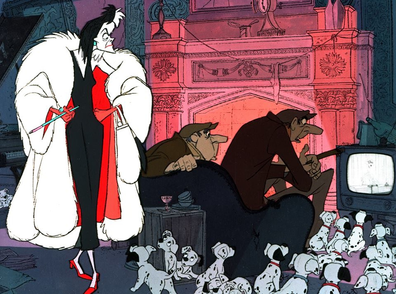 Cruella de Vil, 101 Dalmatians (1961)
Her name has "devil" and "cruel" in it. You would think Roger and Perdita would've taken a hint. It's the perfect title for SOMEONE WHO WANTS TO KILL PUPPIES. She definitely gives the other female villains a run for their money in the crazy category. Her towering presence and outrageous outbursts are sure to bring up those scary childhood memories, because we all had that distant older relative that scared the heck out of us for no valid reason.
Photo via One Hundred and One Dalmatians / Facebook