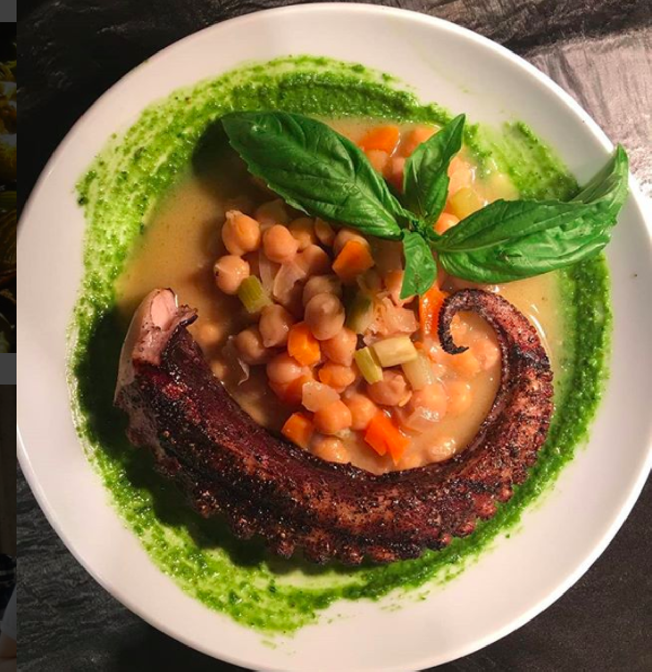 Battalion
604 S. Alamo St., (210) 816-0088, battalionsa.com
Grilled octopus meets a bright pesto with braised chickpeas that'll leave you wanting more.
Photo via Instagram / battalionsa