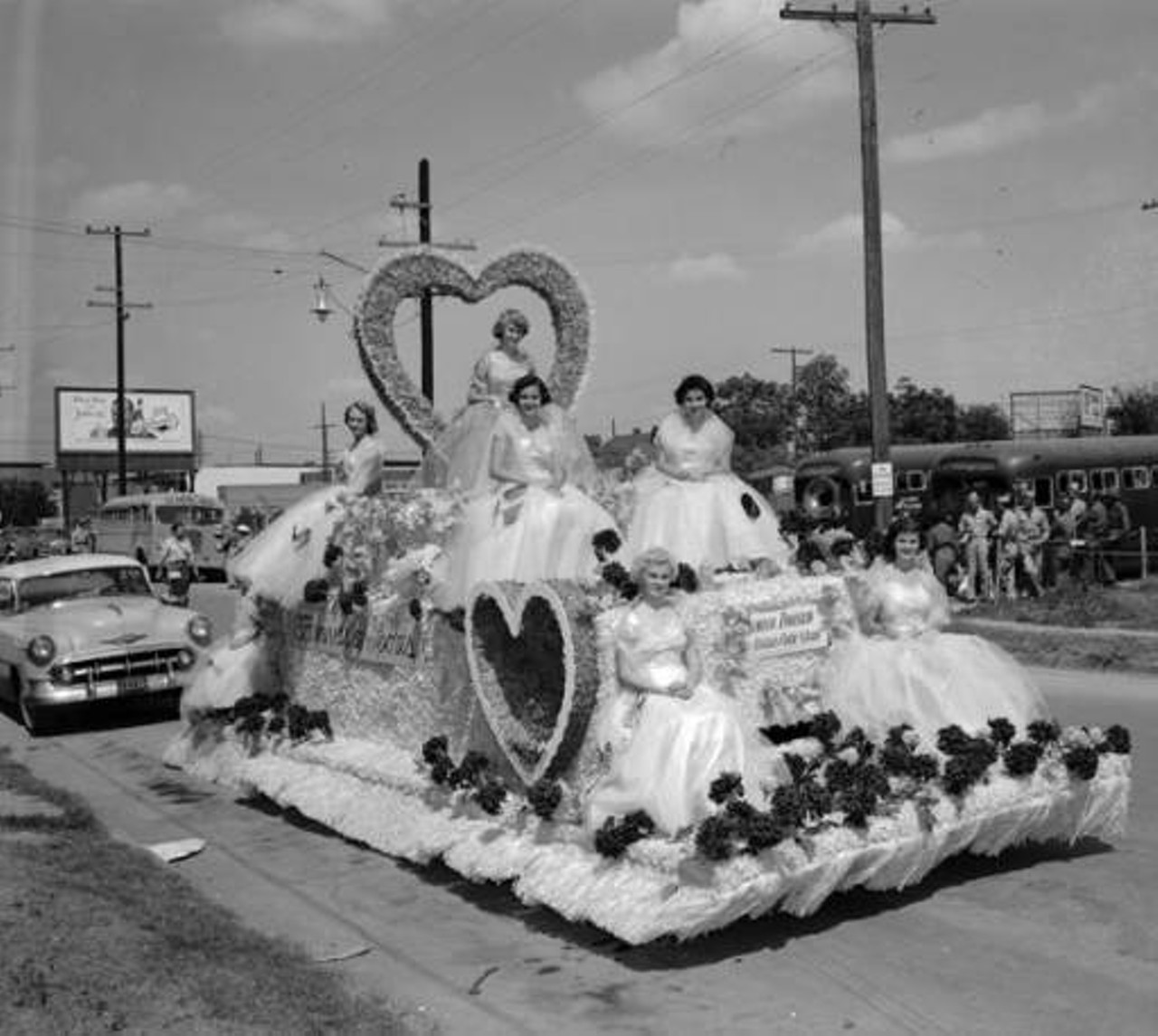 Fiesta Flambeau: Junior Division Public Schools Float, 1954
Fiesta Flambeau, which is part of the eleven days of Fiesta San Antonio, started off as an idea by Reynolds Andricks to be a night parade led by torches. The parade has influences of New Orleans Marti Gras, but is uniquely part of San Antonio culture.
Photo via Zintgraff Studio Photo Collection